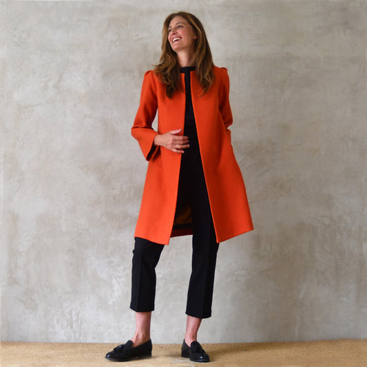 the john coat in burnt orange wool crepe image 0