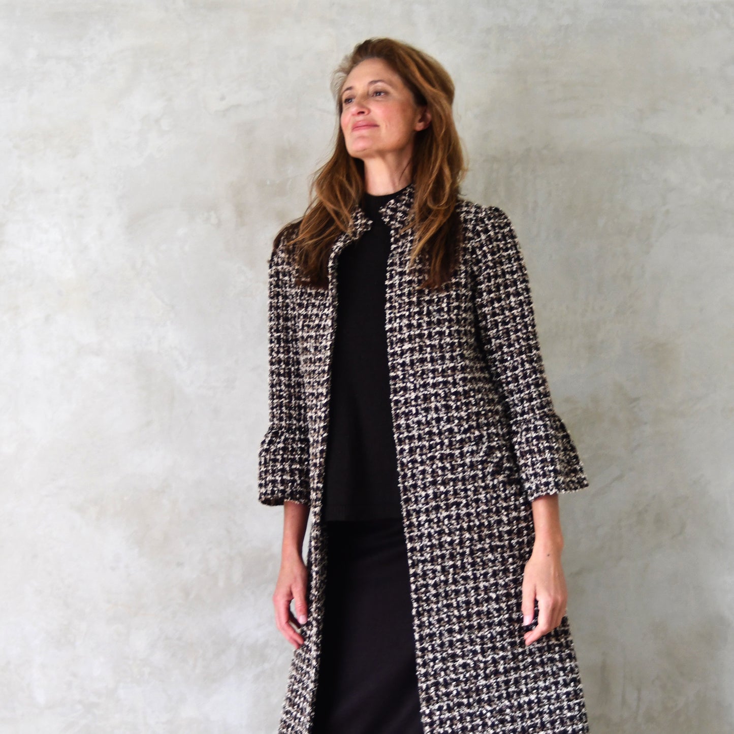 the delany coat in ivory, black, brown and copper bouclé image 10